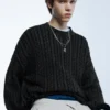 Pull en maille torsadée délavé à l’acide Pull en maille torsadée délavé à l’acide