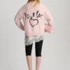 Pull rose avec cœur brodé Pull rose avec cœur brodé
