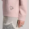 Pull rose avec cœur brodé Pull rose avec cœur brodé