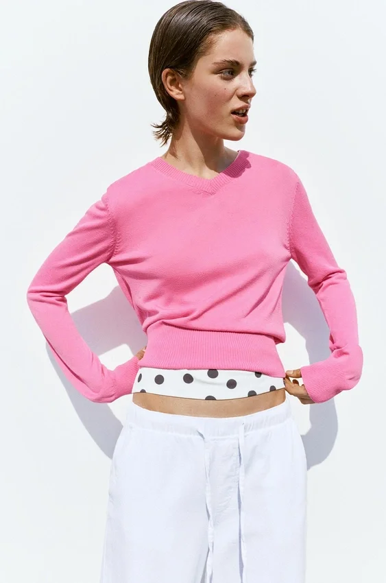 Pull rose à col en V Pull rose à col en V