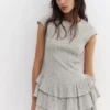 Robe courte à carreaux avec ourlet à volants
