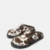 Sabots en cuir imprimé vache STWD Sabots en cuir imprimé vache STWD