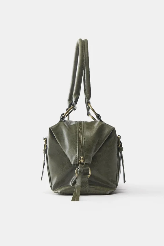 Sac à bandoulière avec boucles Sac à bandoulière avec boucles
