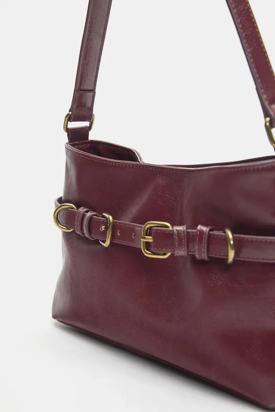 Sac à bandoulière avec boucles Sac à bandoulière avec boucles