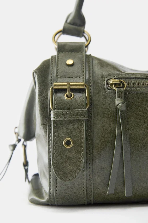 Sac à bandoulière avec boucles Sac à bandoulière avec boucles