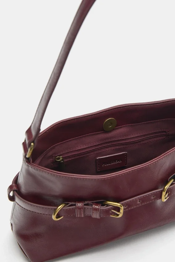 Sac à bandoulière avec boucles Sac à bandoulière avec boucles