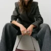 Sac à bandoulière avec boucles Sac à bandoulière avec boucles
