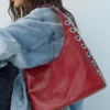 Sac à bandoulière avec clous Sac à bandoulière avec clous