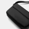 Sac à bandoulière en tissu caoutchouté