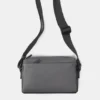 Sac à bandoulière en tissu caoutchouté