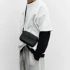 Sac à bandoulière en tissu caoutchouté