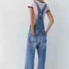 Salopette longue en denim Salopette longue en denim