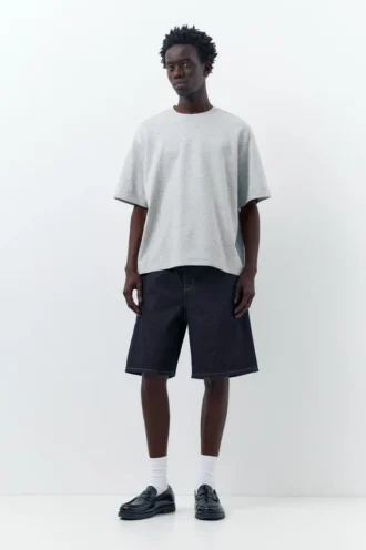 Shorts en denim ample et décontracté en forme de Bermudas
