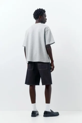 Shorts en denim ample et décontracté en forme de Bermudas