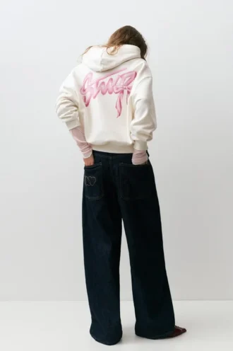 Sweat à capuche avec motif en forme de nœud
