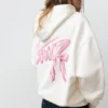 Sweat à capuche avec motif en forme de nœud Sweat à capuche avec motif en forme de nœud