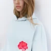 Sweat à capuche avec motif floral Sweat à capuche avec motif floral