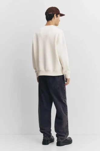 Sweat à capuche avec slogan brodé