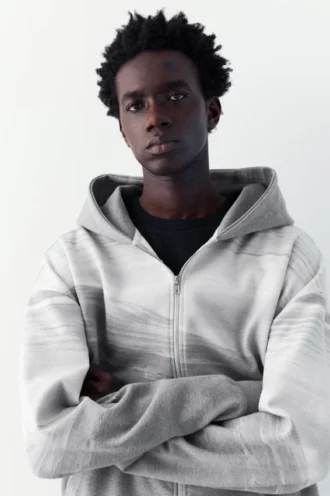 Sweat à capuche zippé en interlock