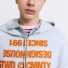 Sweats à capuche zippés avec inscription