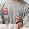 T-shirt à manches doubles avec des patchs T-shirt à manches doubles avec des patchs