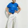 T-shirts bleus avec motifs et slogans T-shirts bleus avec motifs et slogans